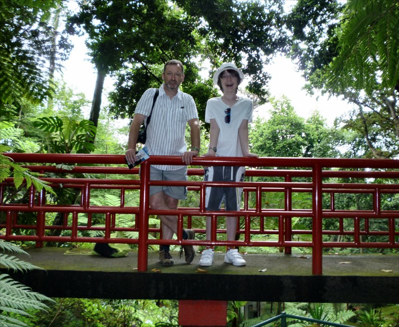 Mark and Ryan on bridge high above gardens